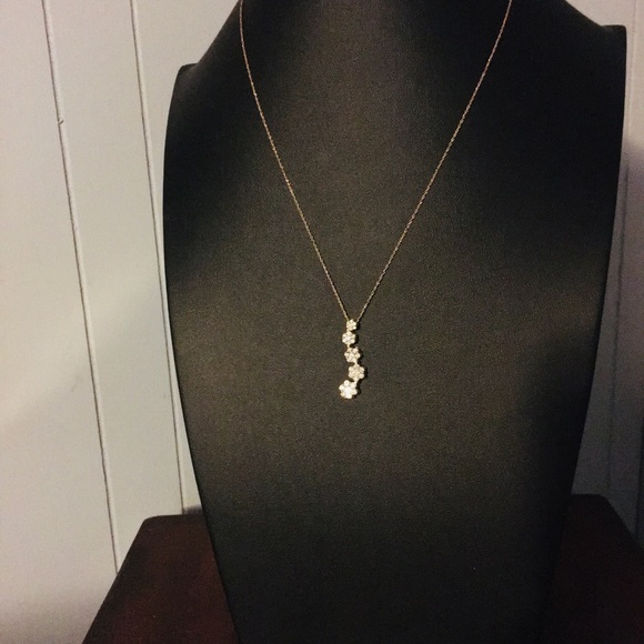 10K (Stamped) Gold Round Diamond Journey Pendant - Picture 7 of 12